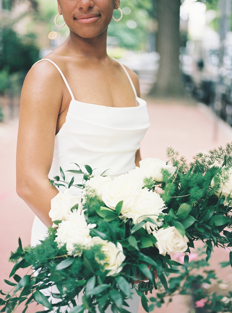 Bridal portrait with bouquet of whites and greens downtown DC