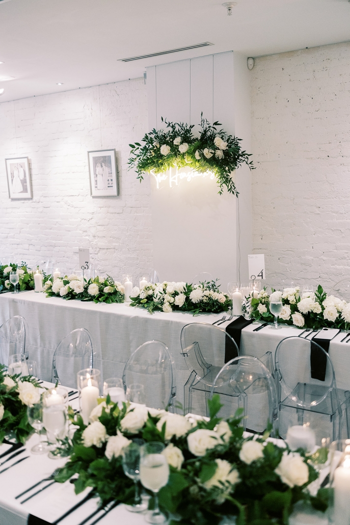 Gallery wedding reception decor with white and black tones