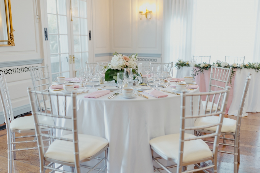 Pink and white wedding reception design
